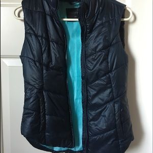 navy blue puffer vest